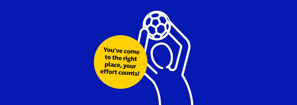 A figure catches a soccer ball.