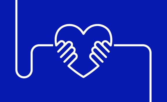 A hand holding a heart